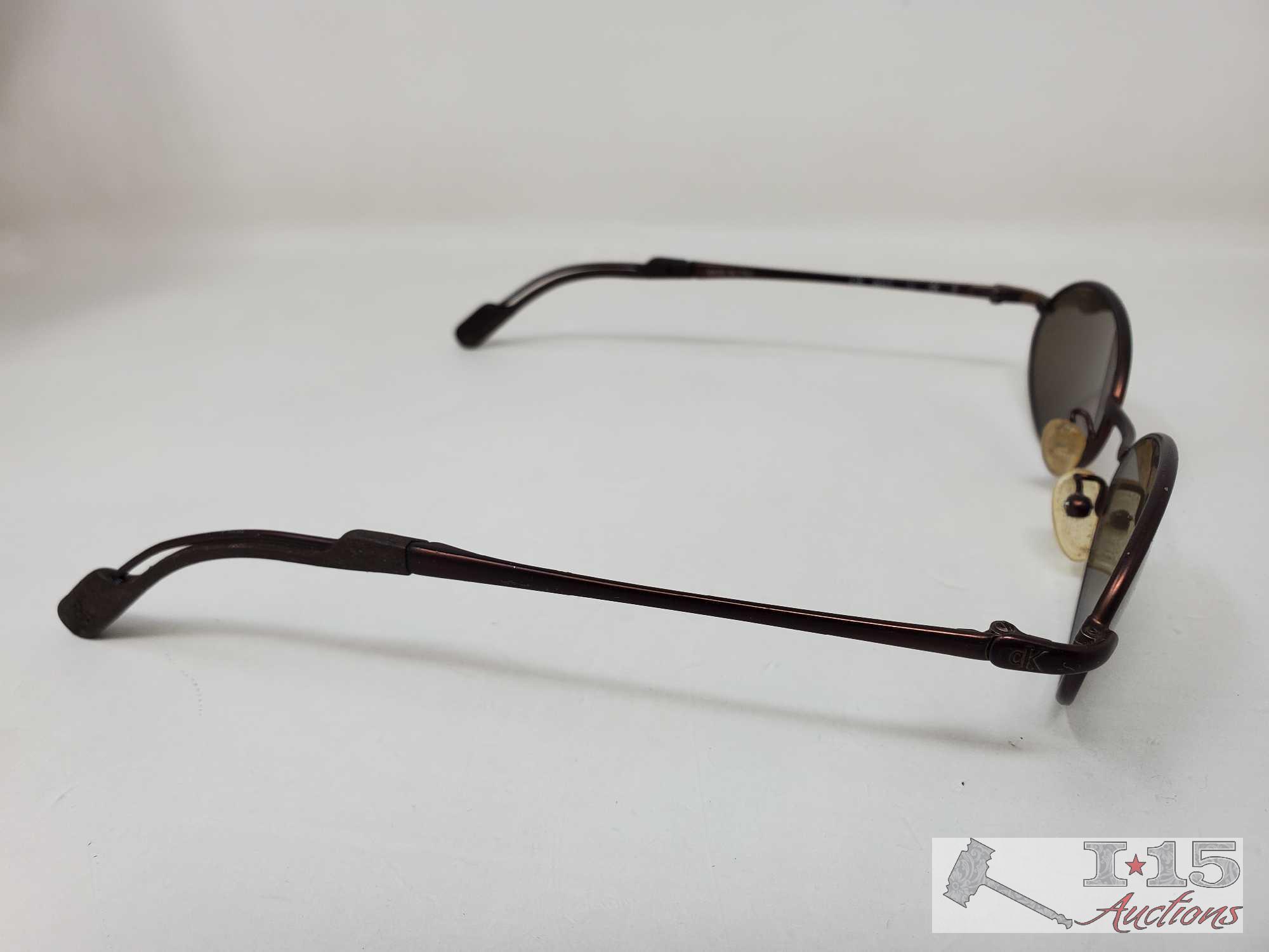 2 Pairs of Sunglasses
