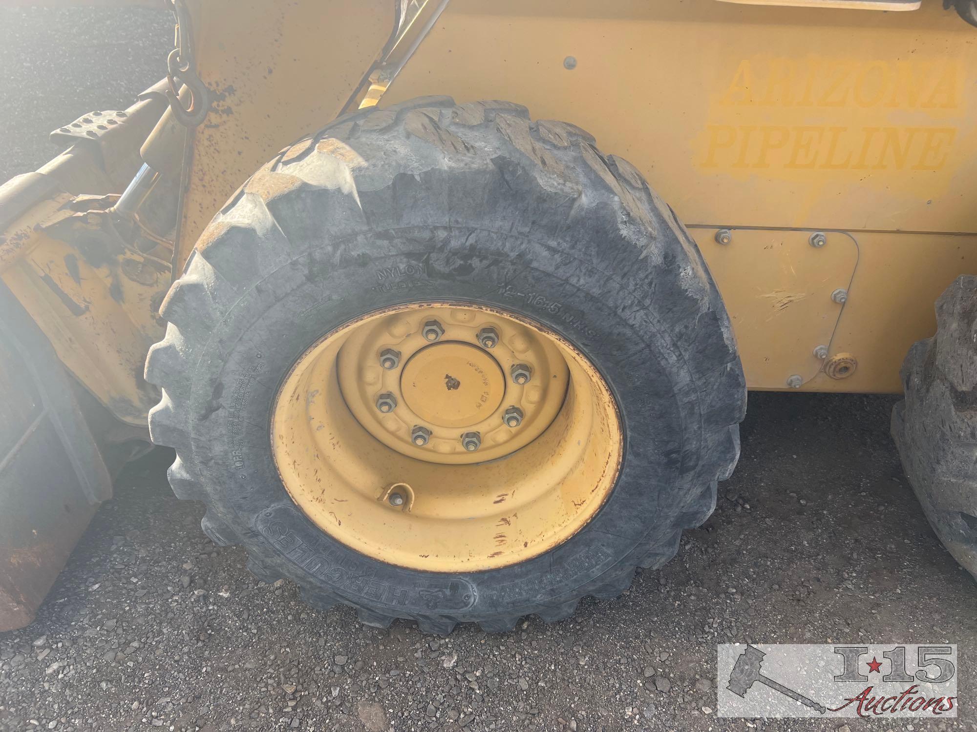 John Deere 320 Skid Steer