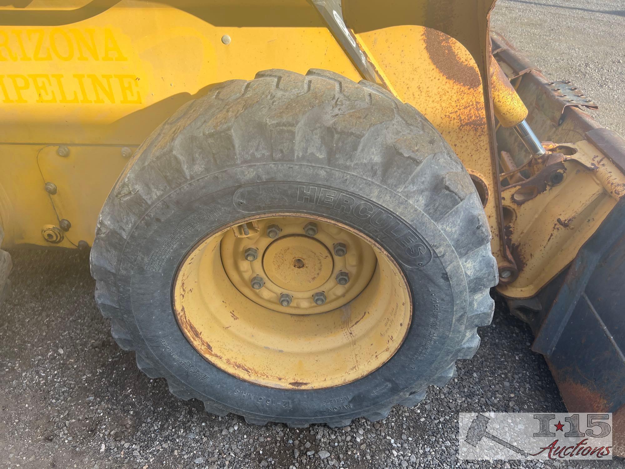 John Deere 320 Skid Steer