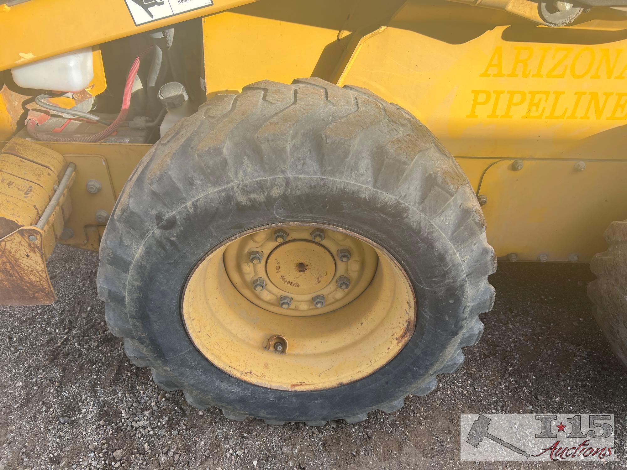 John Deere 320 Skid Steer
