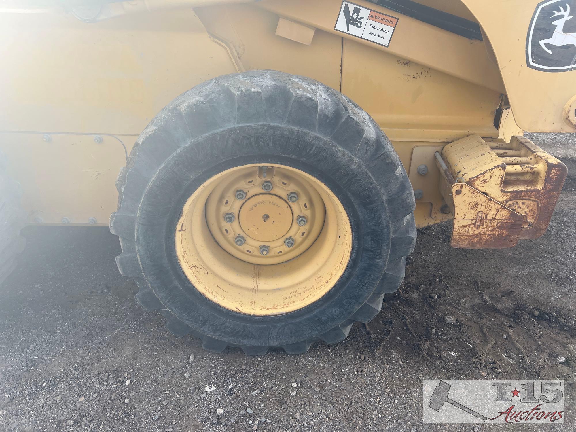 John Deere 320 Skid Steer