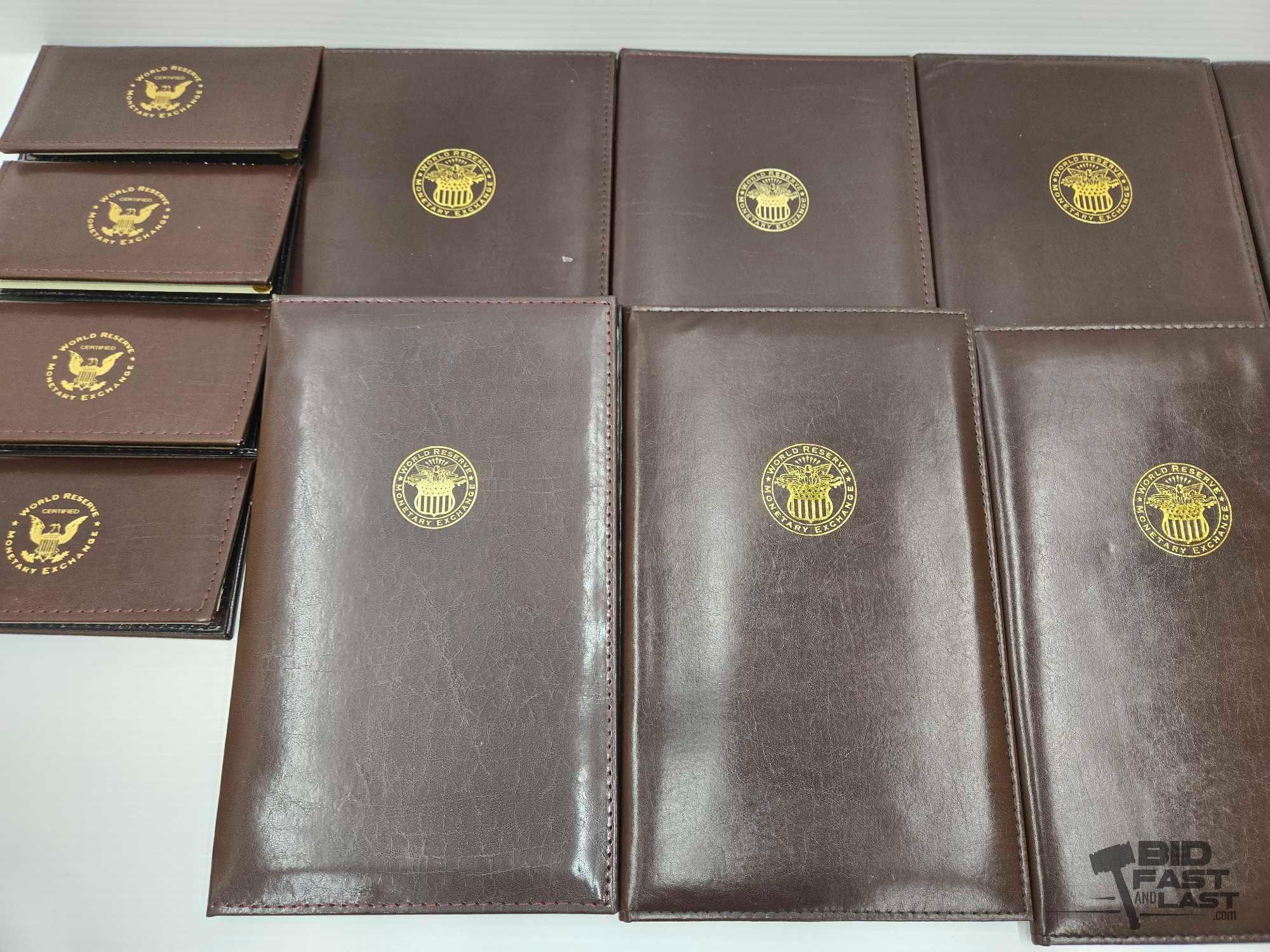 (12) Albums of Uncirculated & Uncut $2 Dollar Bank Notes