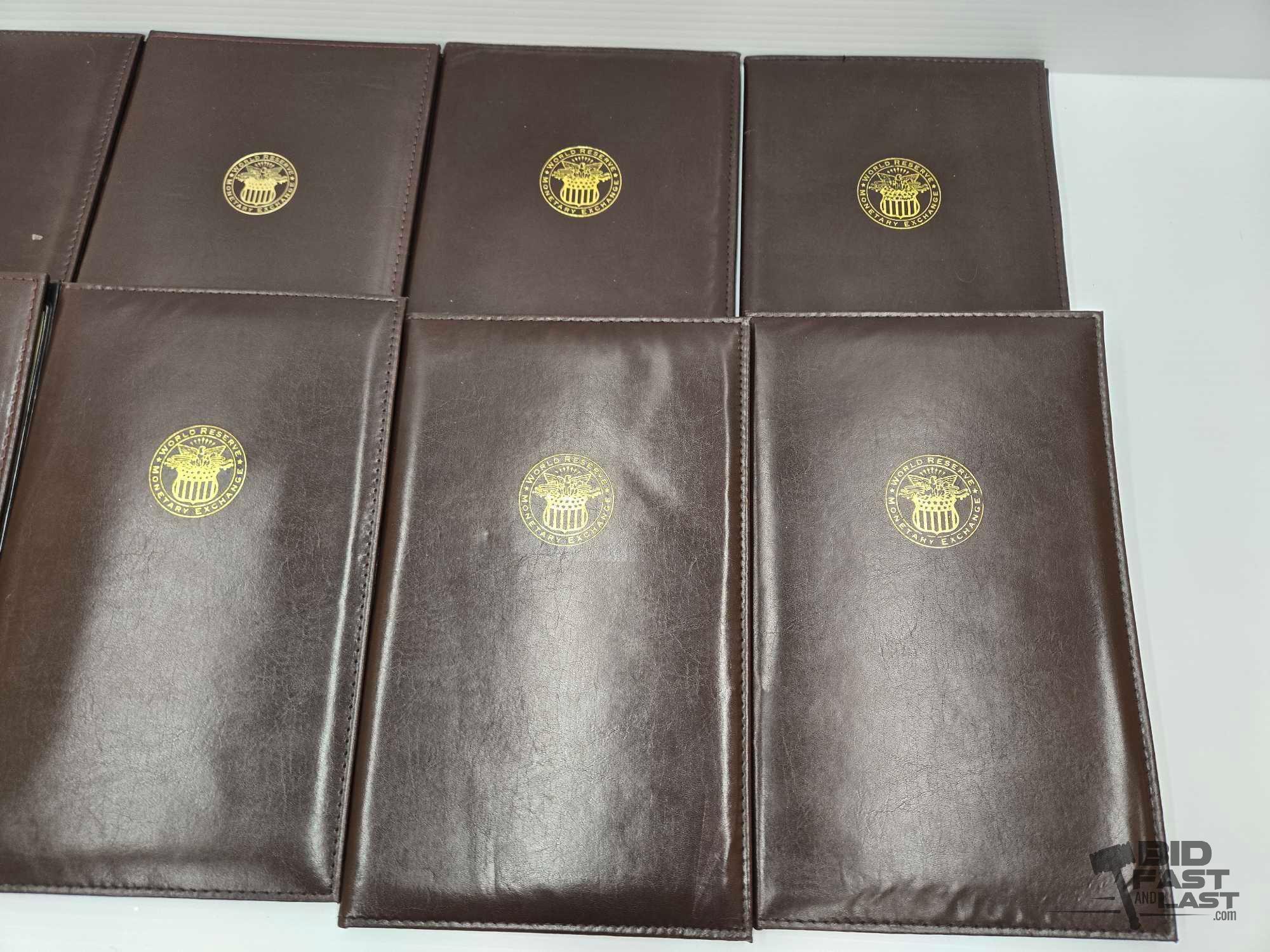 (12) Albums of Uncirculated & Uncut $2 Dollar Bank Notes