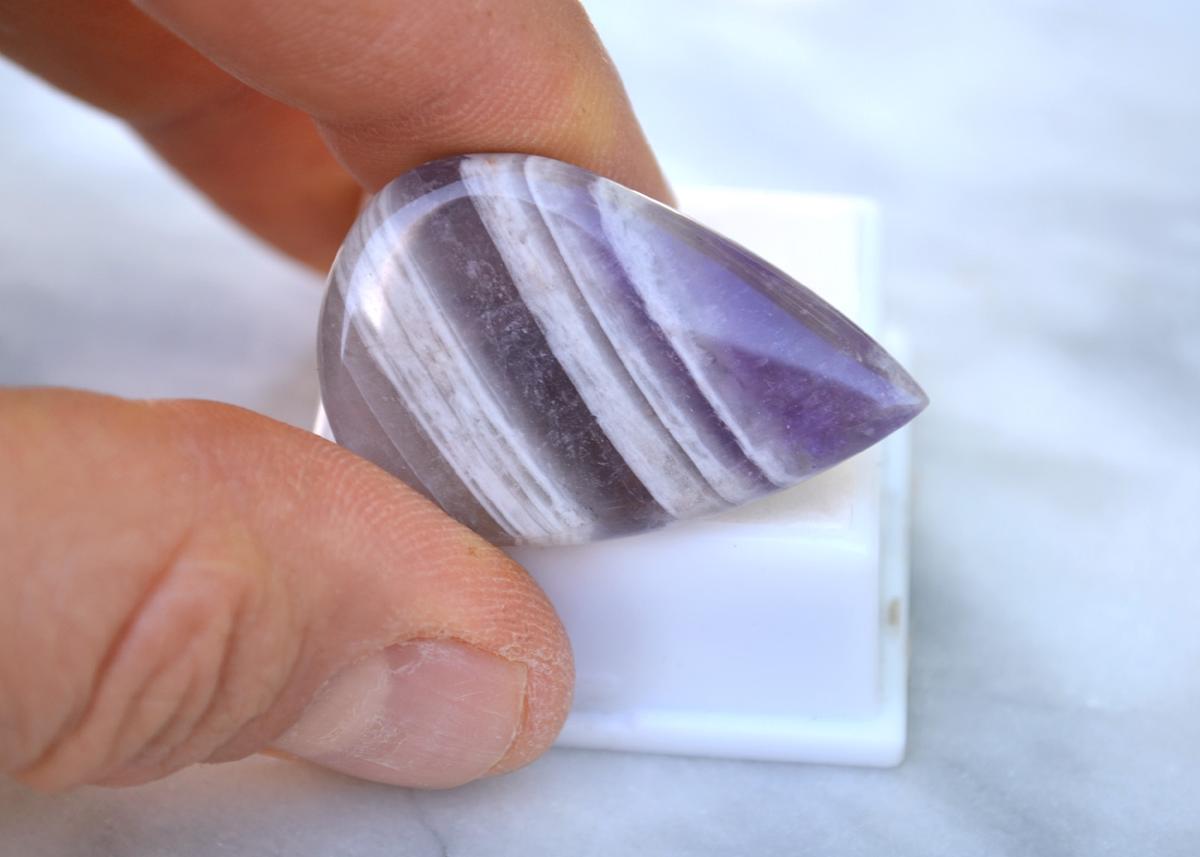 38.09 Carat Pear Shaped Amethyst Cabochon