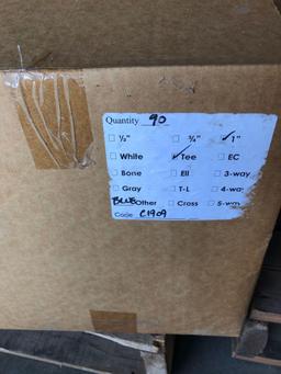 Pallet with Blue PVC Couplings in Boxes