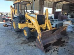 John Deere 310 E Backhoe Loader