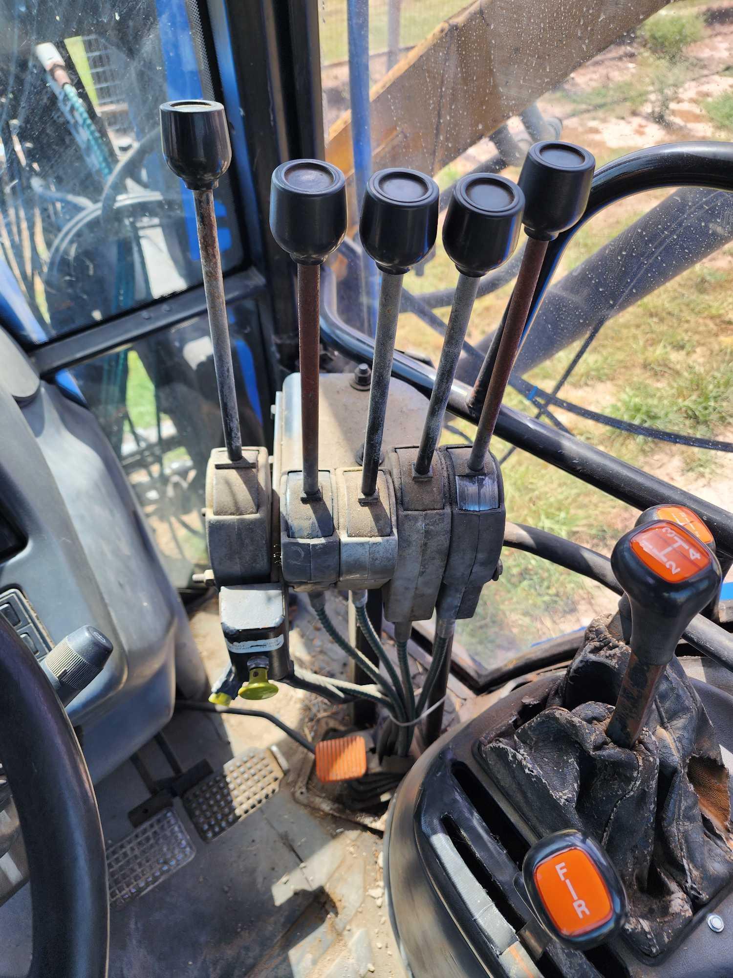 New Holland Model TS100 Tractor w/Shredder and Boom Attachment, Srl. #05418
