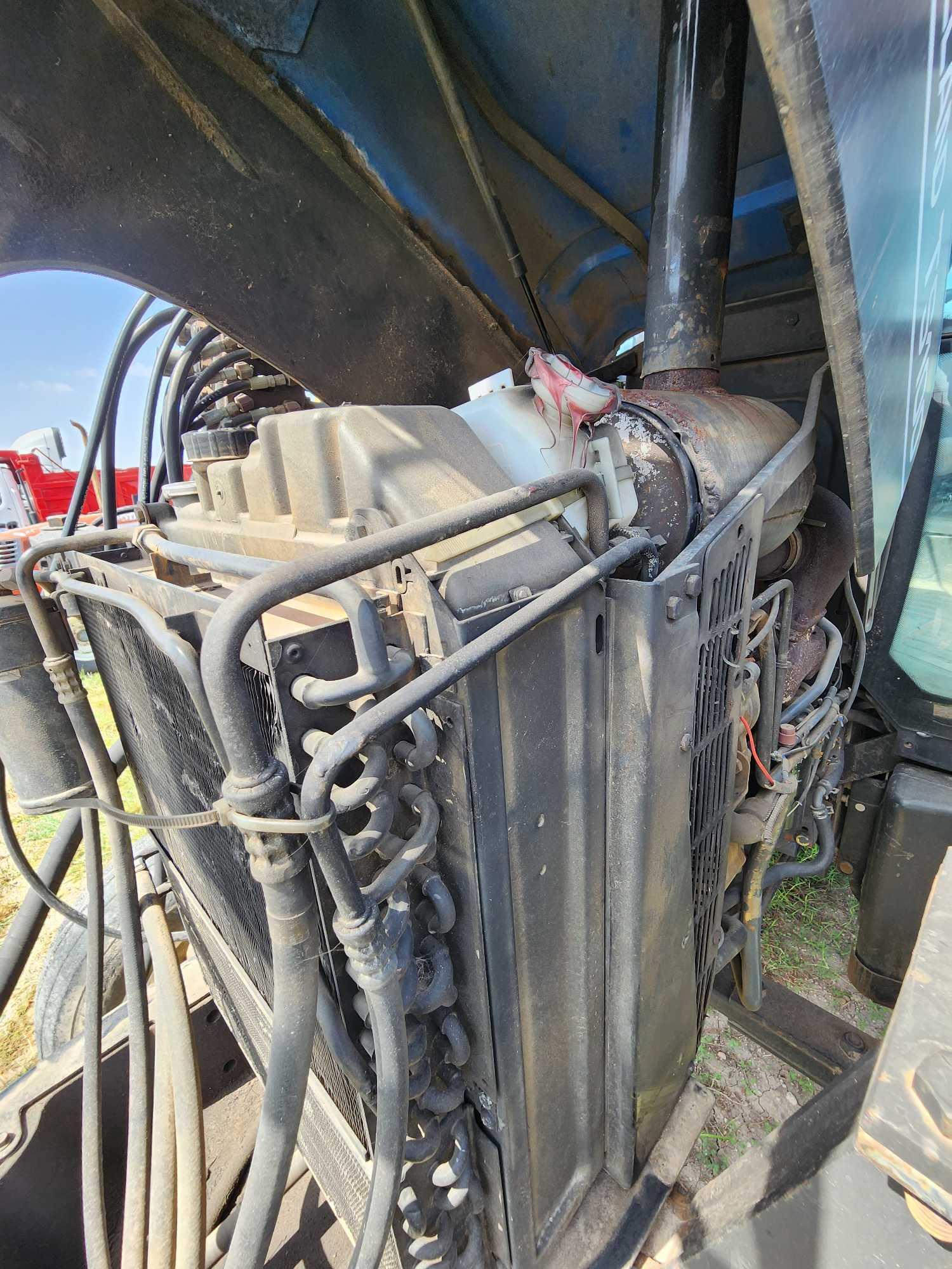 New Holland Model TS100 Tractor w/Shredder and Boom Attachment, Srl. #05418
