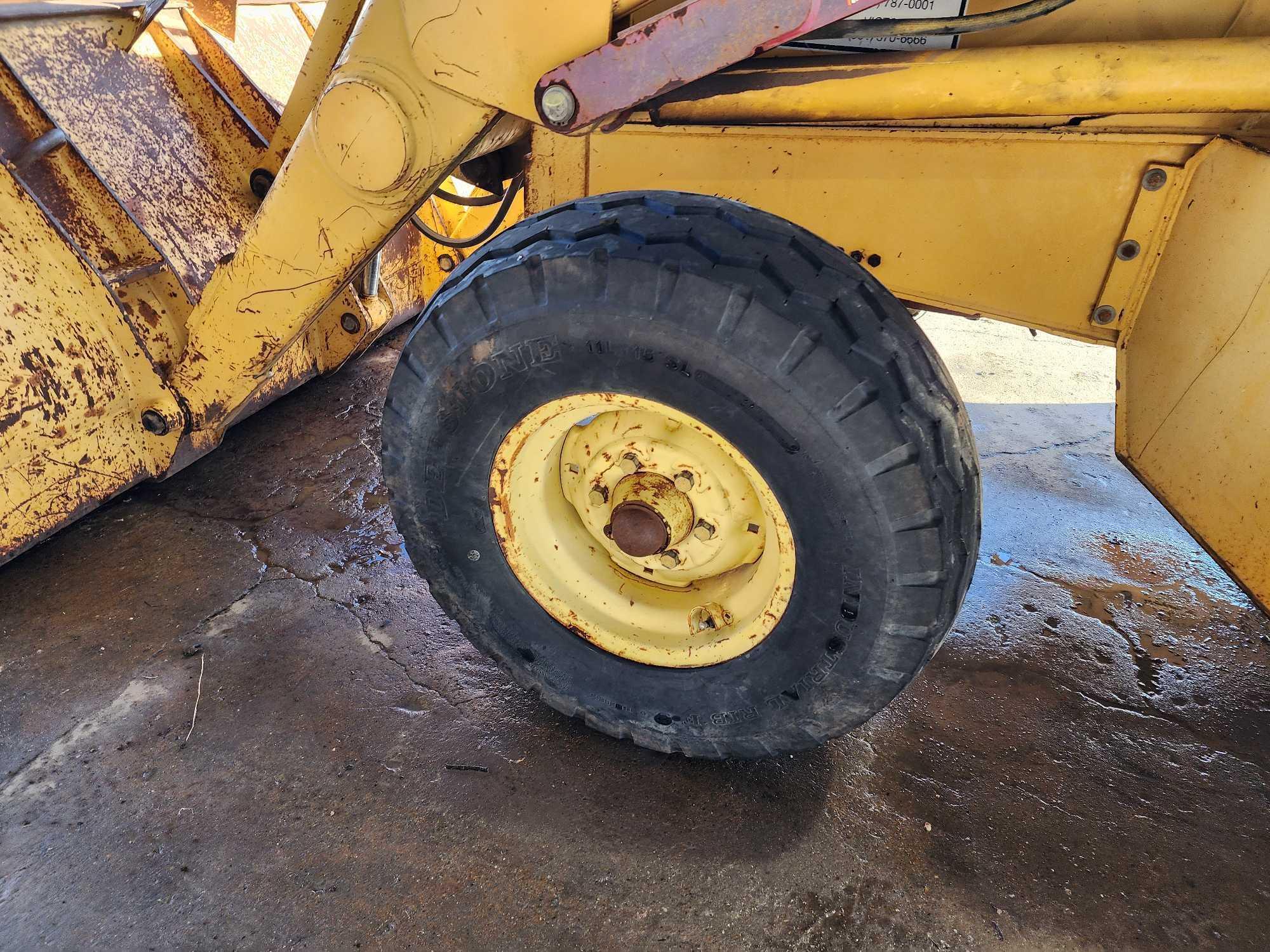 John Deere 300D Backhoe Loader