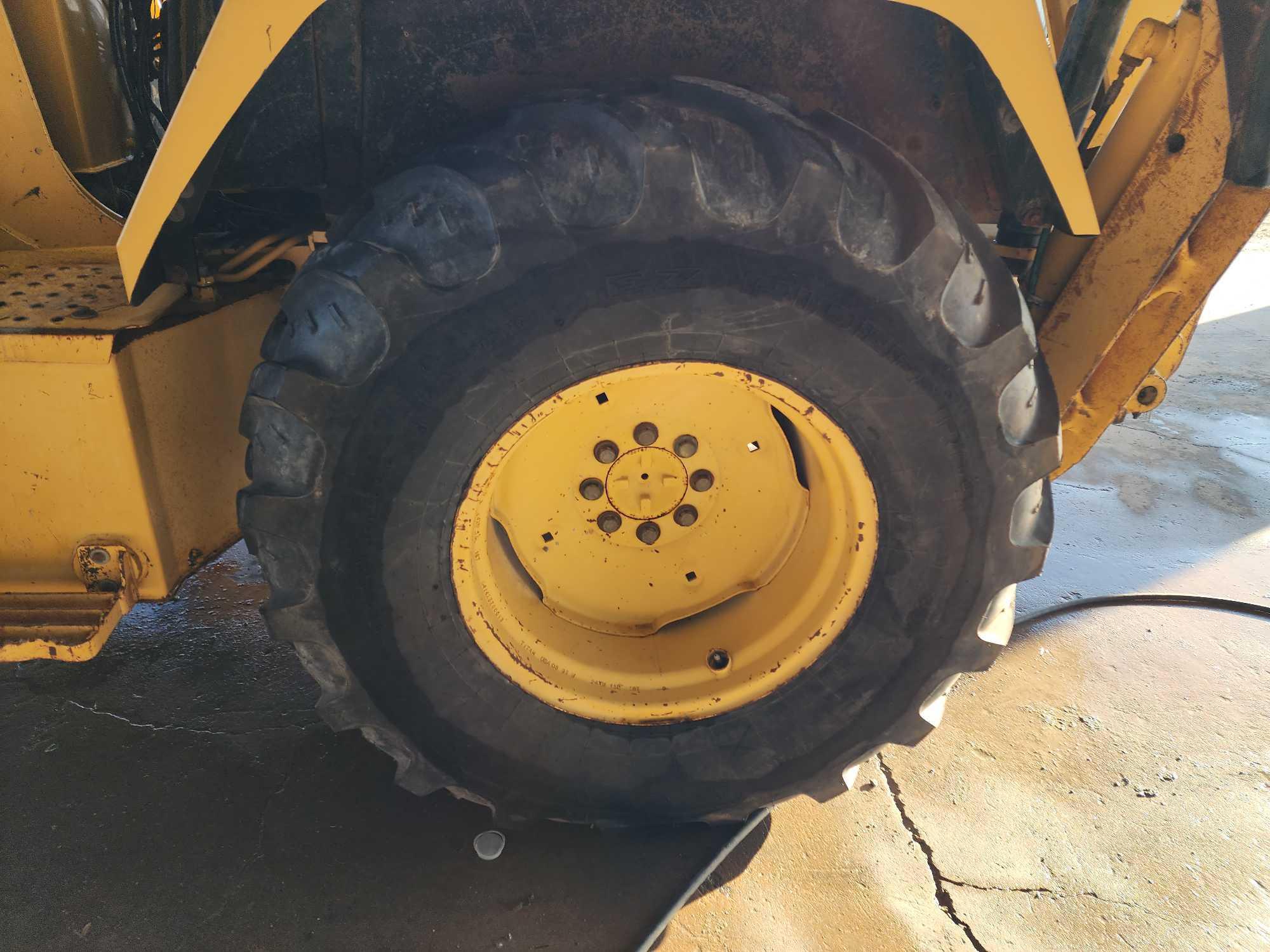 John Deere 300D Backhoe Loader