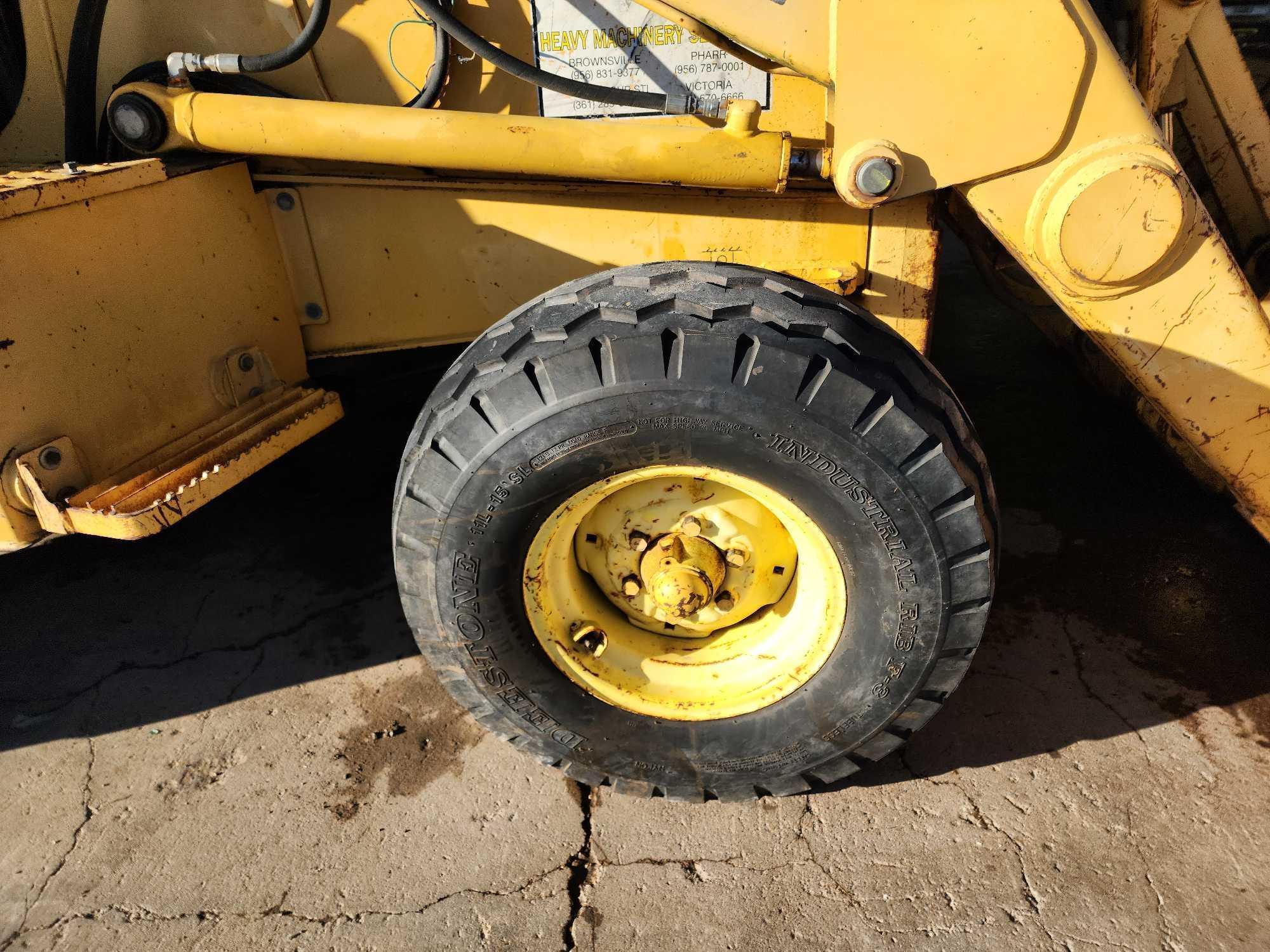 John Deere 300D Backhoe Loader