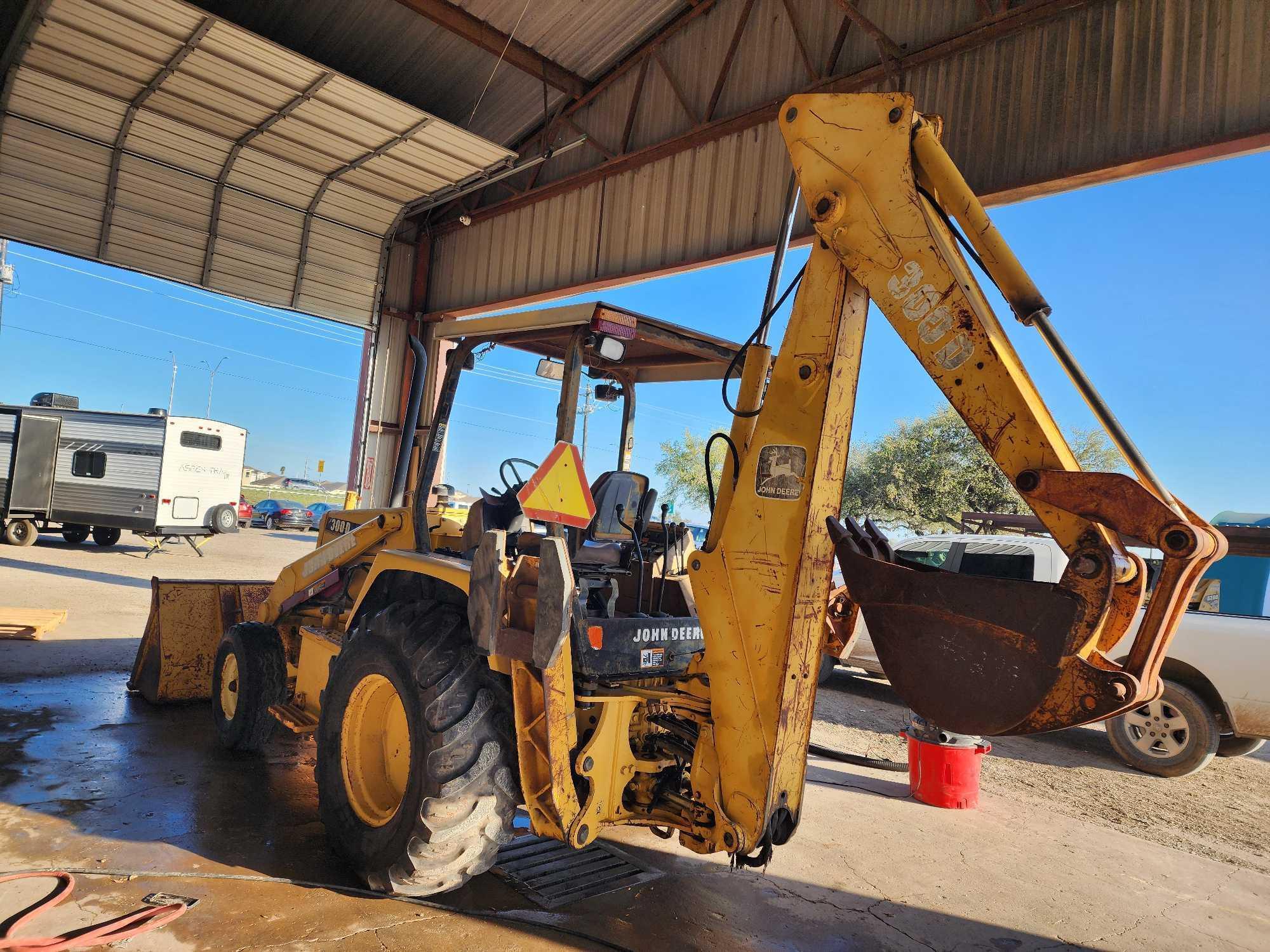 John Deere 300D Backhoe Loader