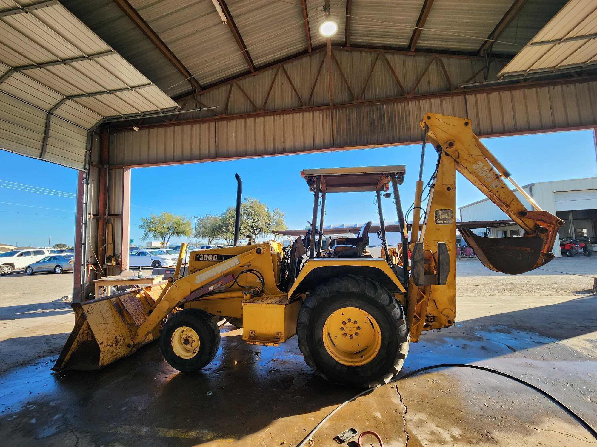 John Deere 300D Backhoe Loader