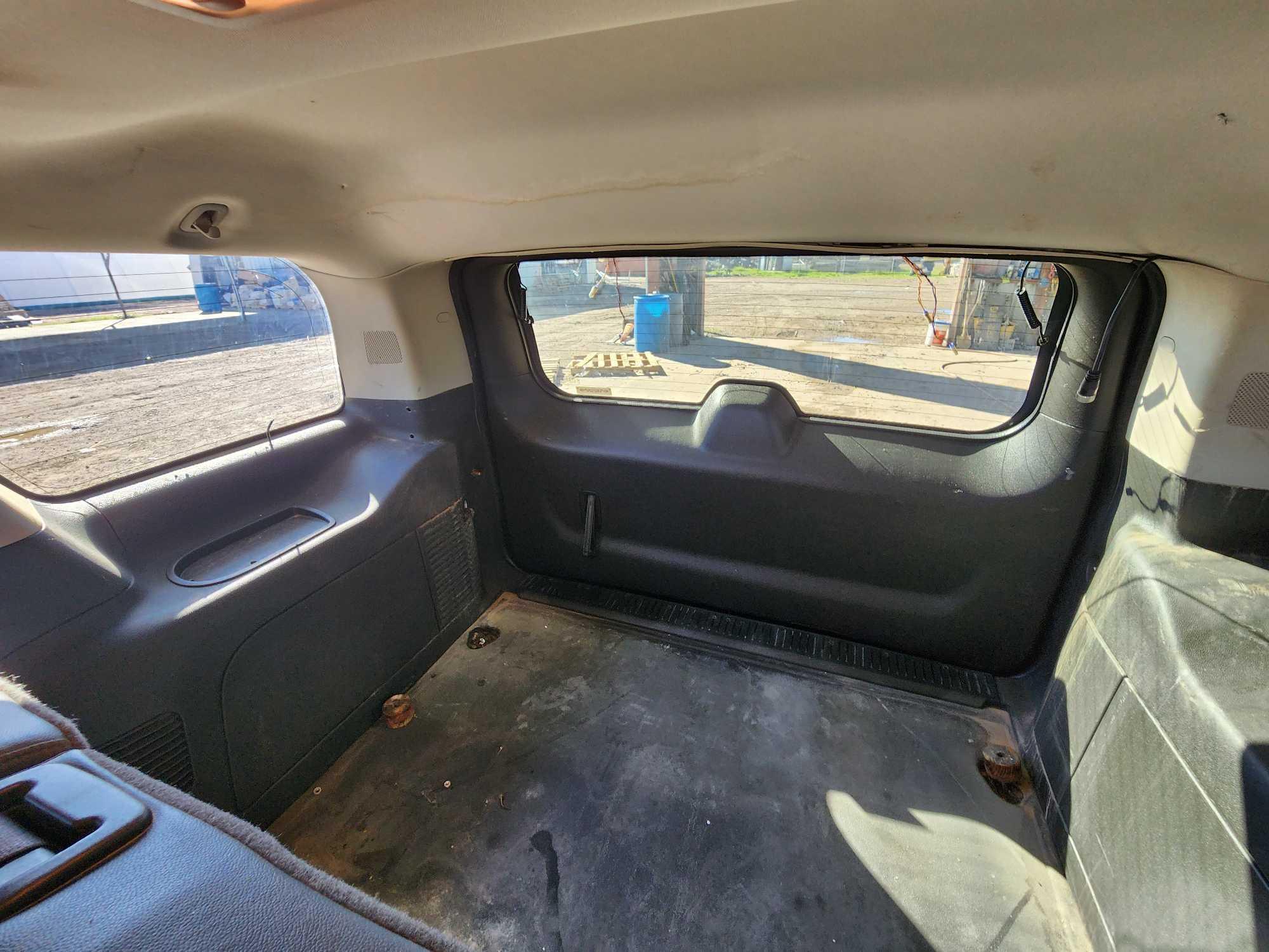 2009 Chevrolet Tahoe Multipurpose Vehicle (MPV), VIN # 1GNEC03089R254905