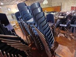 Group of Blue Plastic Student Stackable Chairs