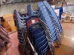 Group of Blue Plastic Student Stackable Chairs