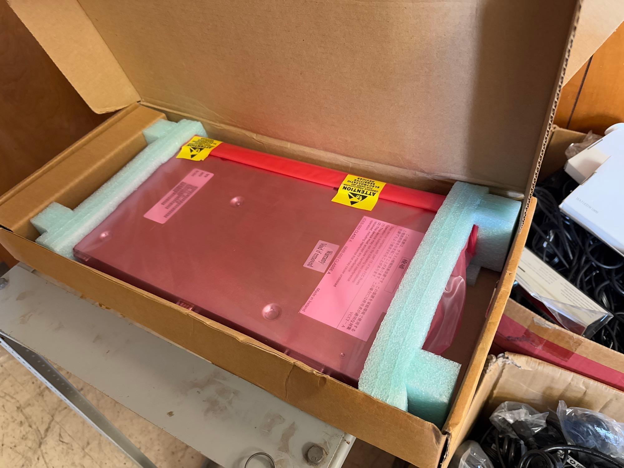 Group of Boxes w/ Laptop Chargers, HDMI Cables, (1) CradlePoint Router, (1) Fujitsu Scanner, etc.