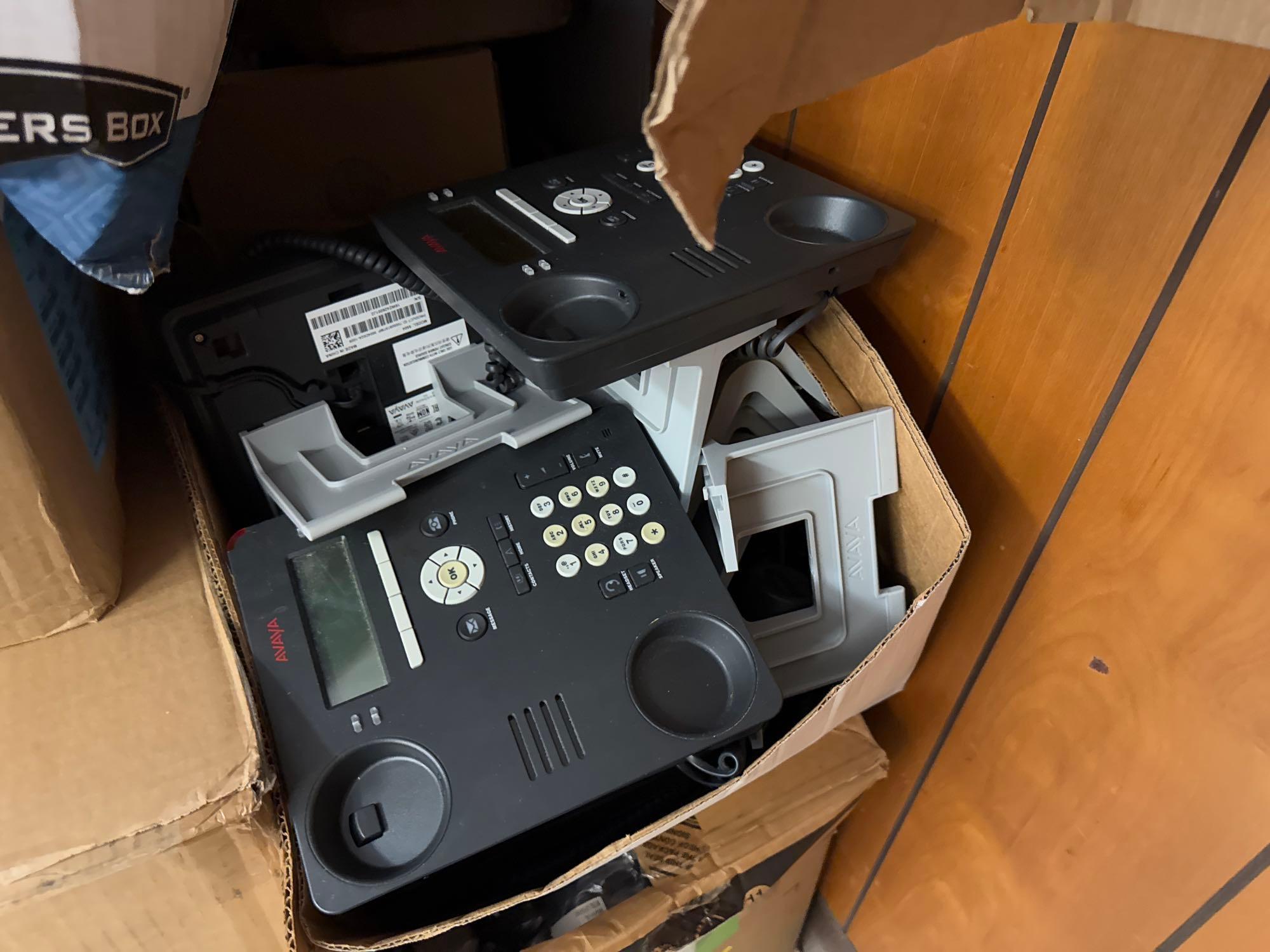 Group of Boxes w/ Desktop Office Phones, (1) Nortel Network Expansion Unit. OFFSITE: BROWNSVILLE,