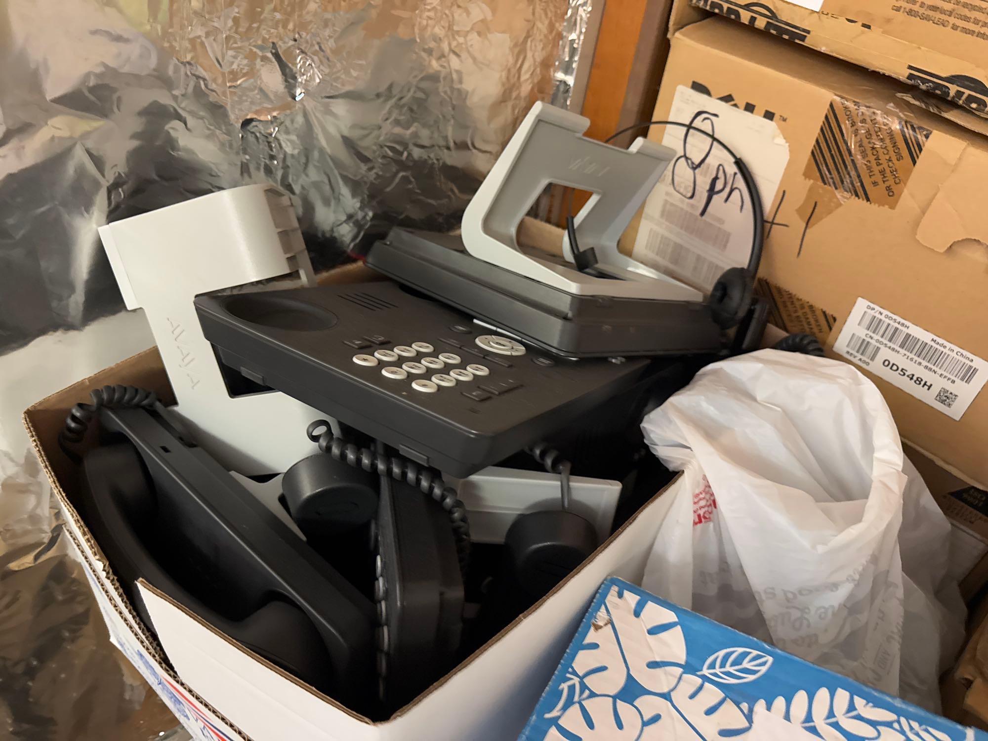 Group of Boxes w/ Desktop Office Phones, (1) Nortel Network Expansion Unit. OFFSITE: BROWNSVILLE,