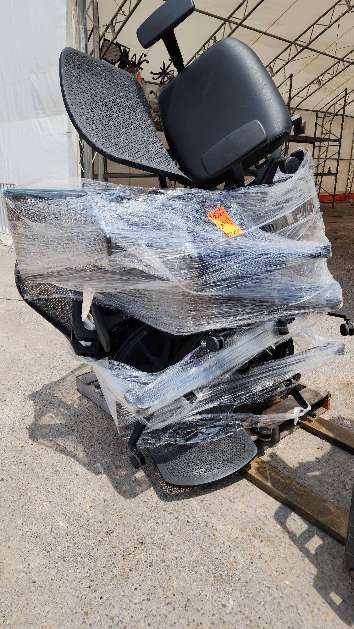 Group of Rolling Office Chairs on Pallet