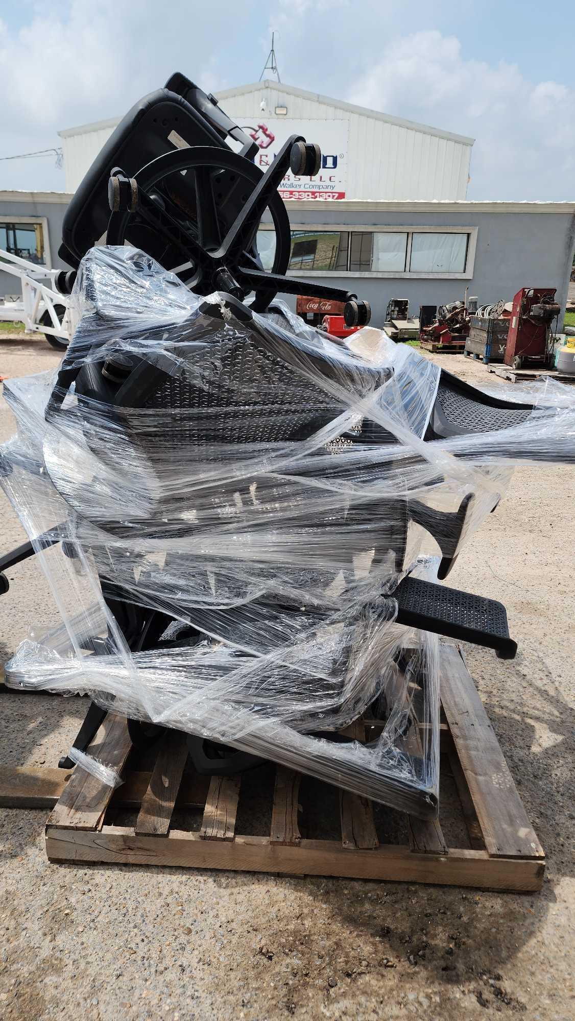 Group of Rolling Office Chairs on Pallet