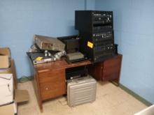 Group of Assorted Power Conditioners, Wood Desk, (1) Hardcover Briefcase, Misc. Items. OFFSITE:
