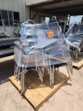 Group of Stackable Student Chairs on Pallet