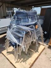 Group of Stackable Student Chairs on Pallet