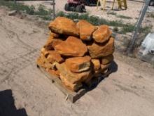 Group of Orange Stone Boulders on Pallet