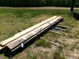 STACK OF ROUGH CUT LUMBER