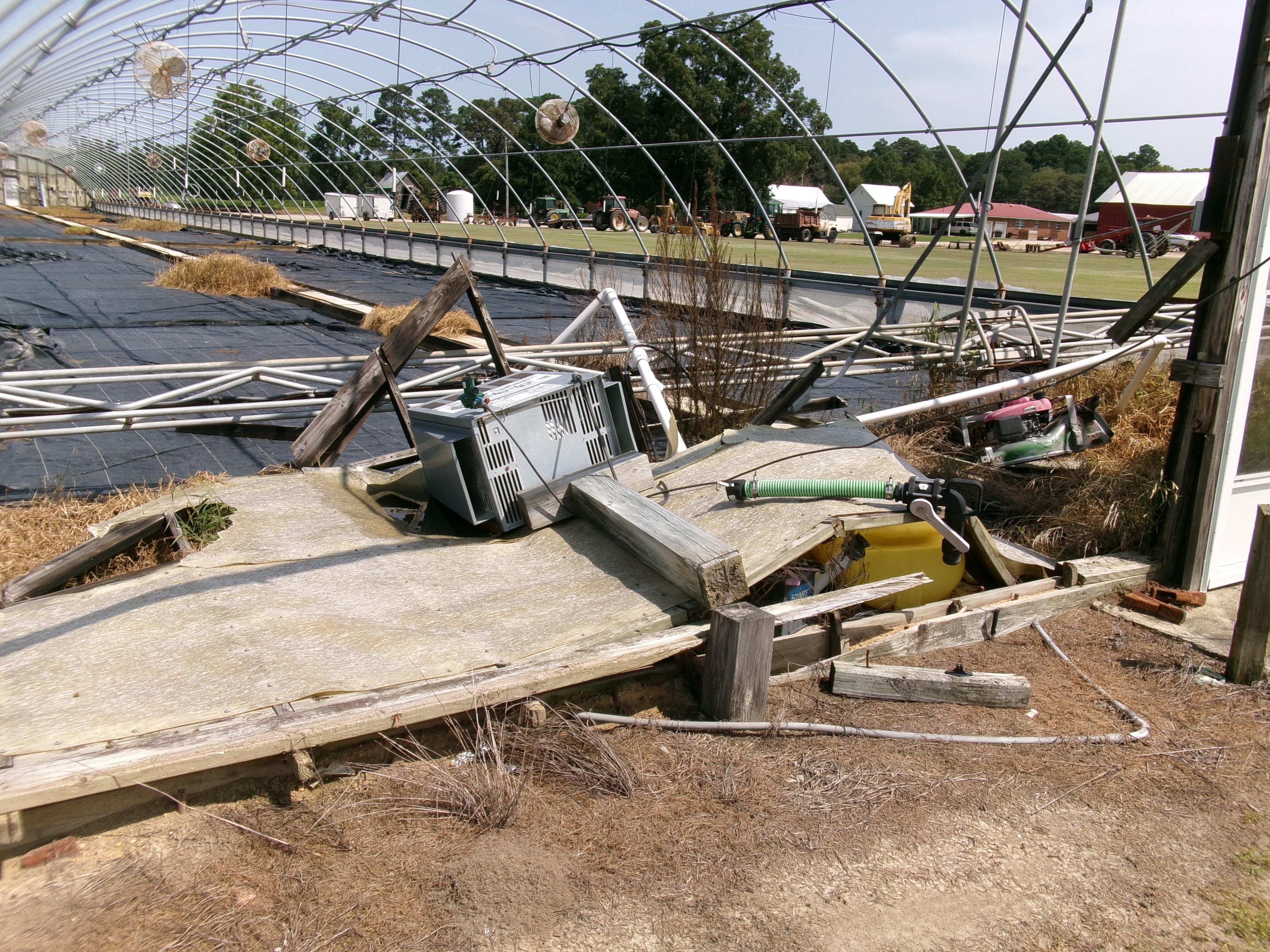 300' X 36' CAROLINA GREENHOUSE WITH HEATERS, FANS, AND A MOWER BOOM