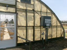 300' X 36' CAROLINA GREENHOUSE WITH HEATERS, FANS, AND A MOWER BOOM