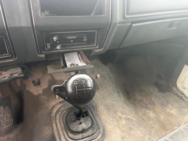 1993 FORD DUMP TRUCK GAS 5-SPD TRANS 14’ HARSH DUMP