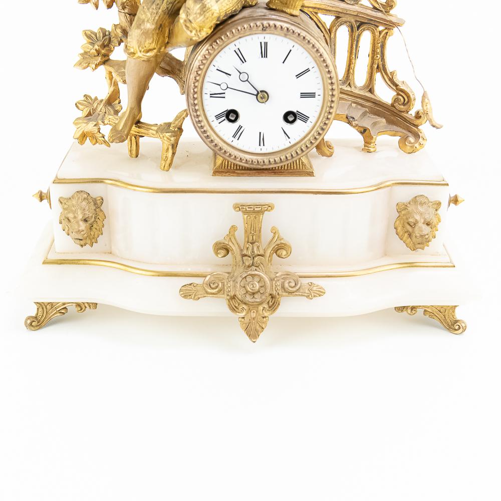 J Marti Medaille Gilt Boy Fishing Mantle Clock