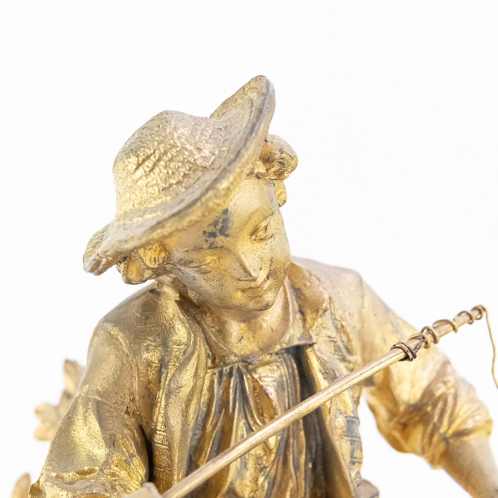 J Marti Medaille Gilt Boy Fishing Mantle Clock