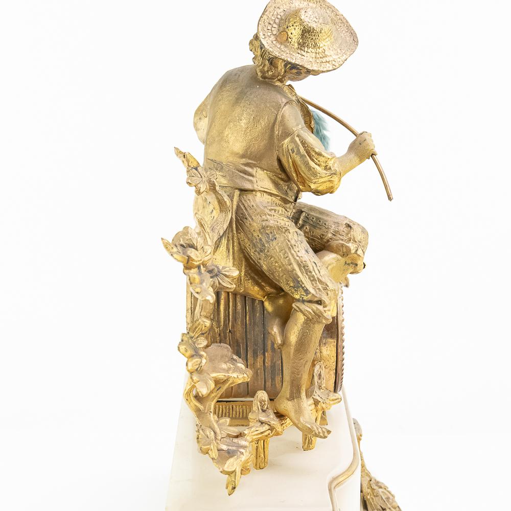 J Marti Medaille Gilt Boy Fishing Mantle Clock