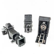 3 Cameras w Accessories - Leica, Rolleiflex, Kodak