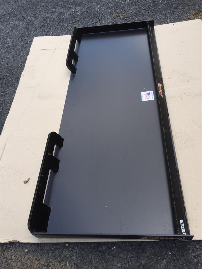 New skid steer quick attach plate