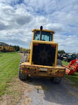 John Deere TC 62H, Cab, Heat, AC, 3rd Valve, Coupler, GP Bucket, 20.5R25 Rubber, SN: 573351, Hours: