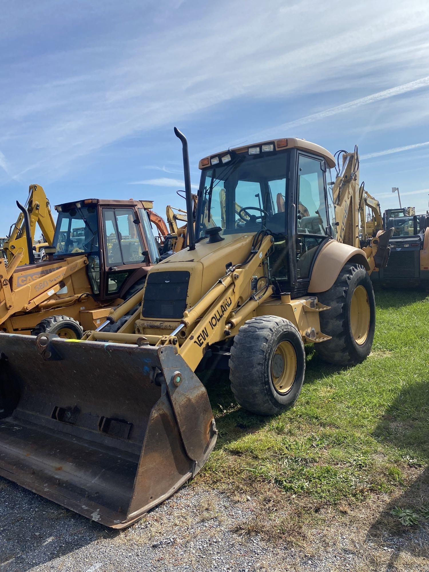 New Holland 655E, Cab, Heat, 4x4, Ext hoe, Aux Hyd, 4-n-1 Bucket, SN: 019165, Hours: 3663