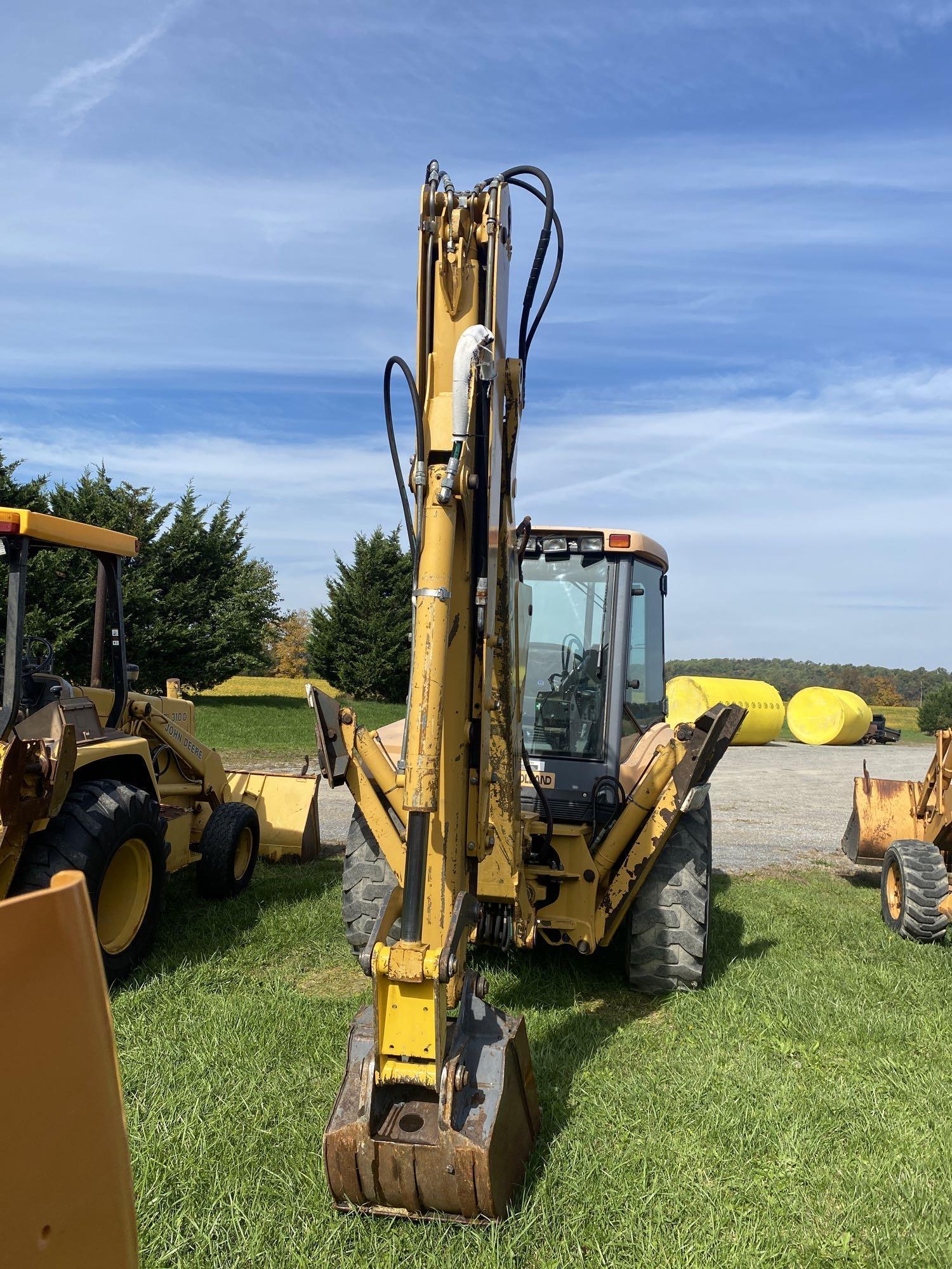 New Holland 655E, Cab, Heat, 4x4, Ext hoe, Aux Hyd, 4-n-1 Bucket, SN: 019165, Hours: 3663