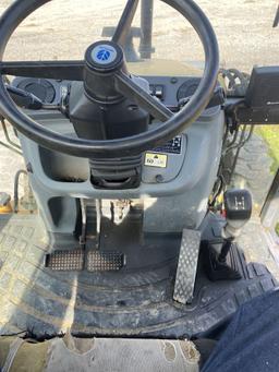 New Holland 655E, Cab, Heat, 4x4, Ext hoe, Aux Hyd, 4-n-1 Bucket, SN: 019165, Hours: 3663