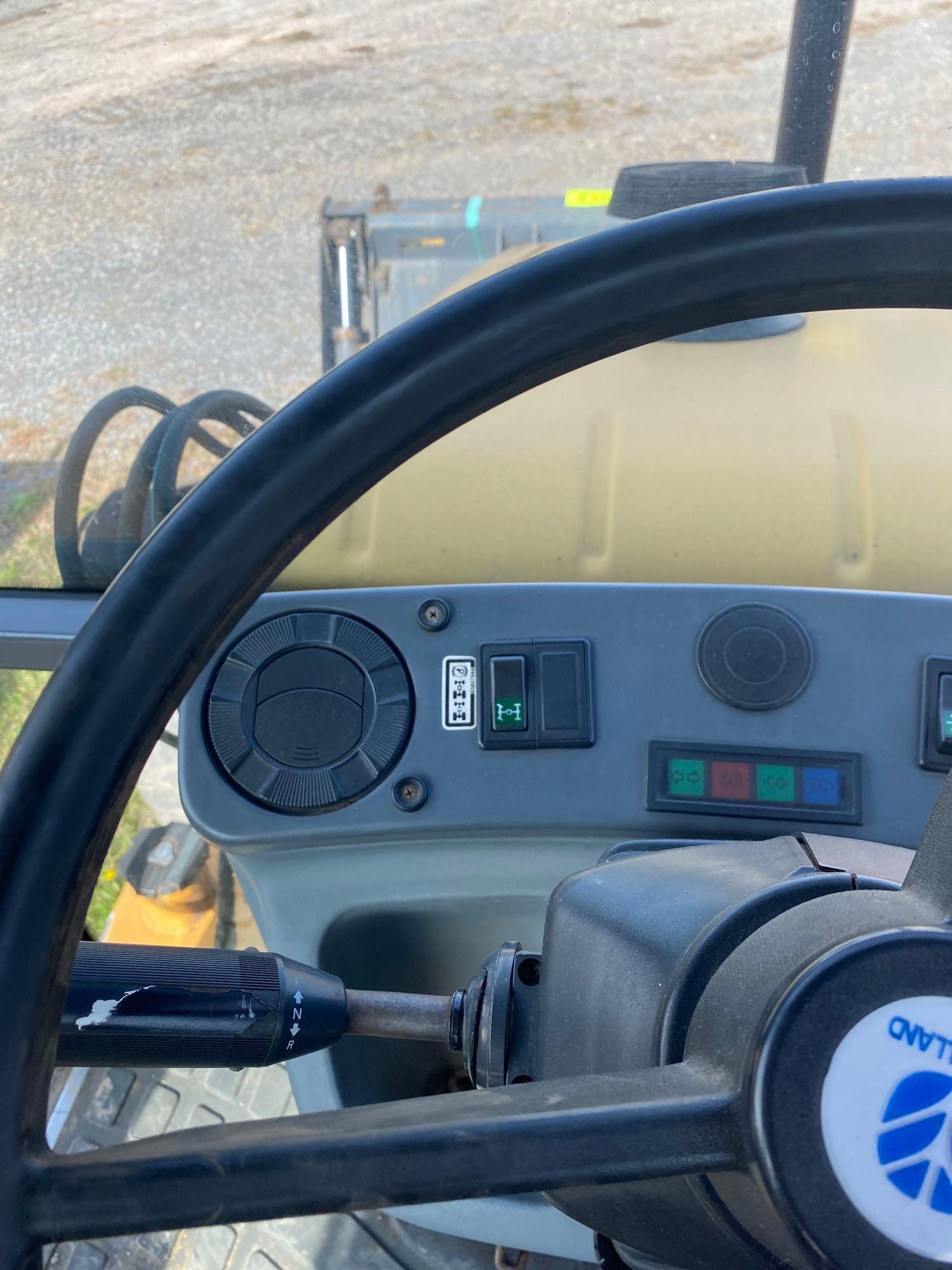 New Holland 655E, Cab, Heat, 4x4, Ext hoe, Aux Hyd, 4-n-1 Bucket, SN: 019165, Hours: 3663