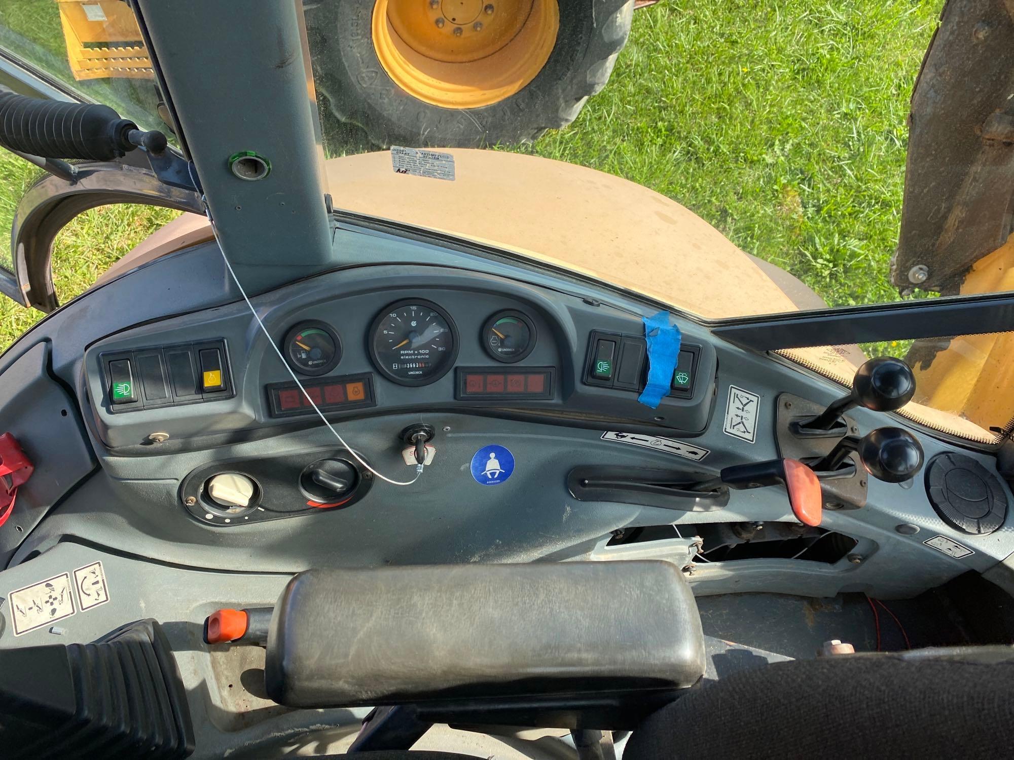New Holland 655E, Cab, Heat, 4x4, Ext hoe, Aux Hyd, 4-n-1 Bucket, SN: 019165, Hours: 3663
