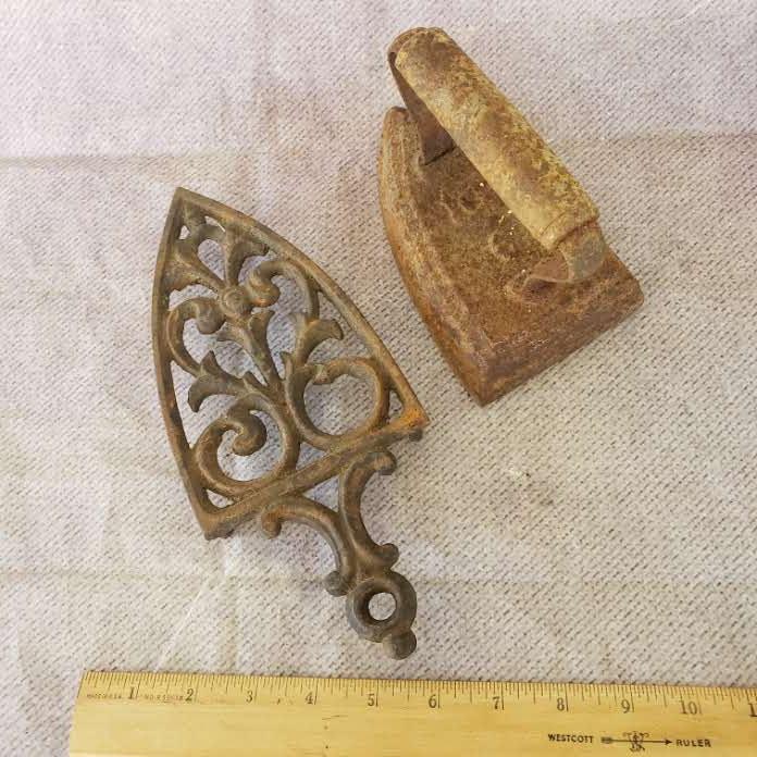 Ornate Cast Iron Stand and Sad Iron