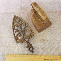 Ornate Cast Iron Stand and Sad Iron