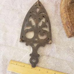 Ornate Cast Iron Stand and Sad Iron