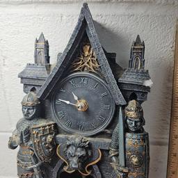 Resin Battery Operated Pendulum Wall Clock, Medieval Castle with Lion Head and 2 Knights