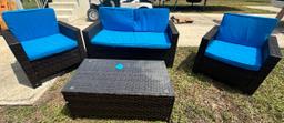 Brown wicker patio set