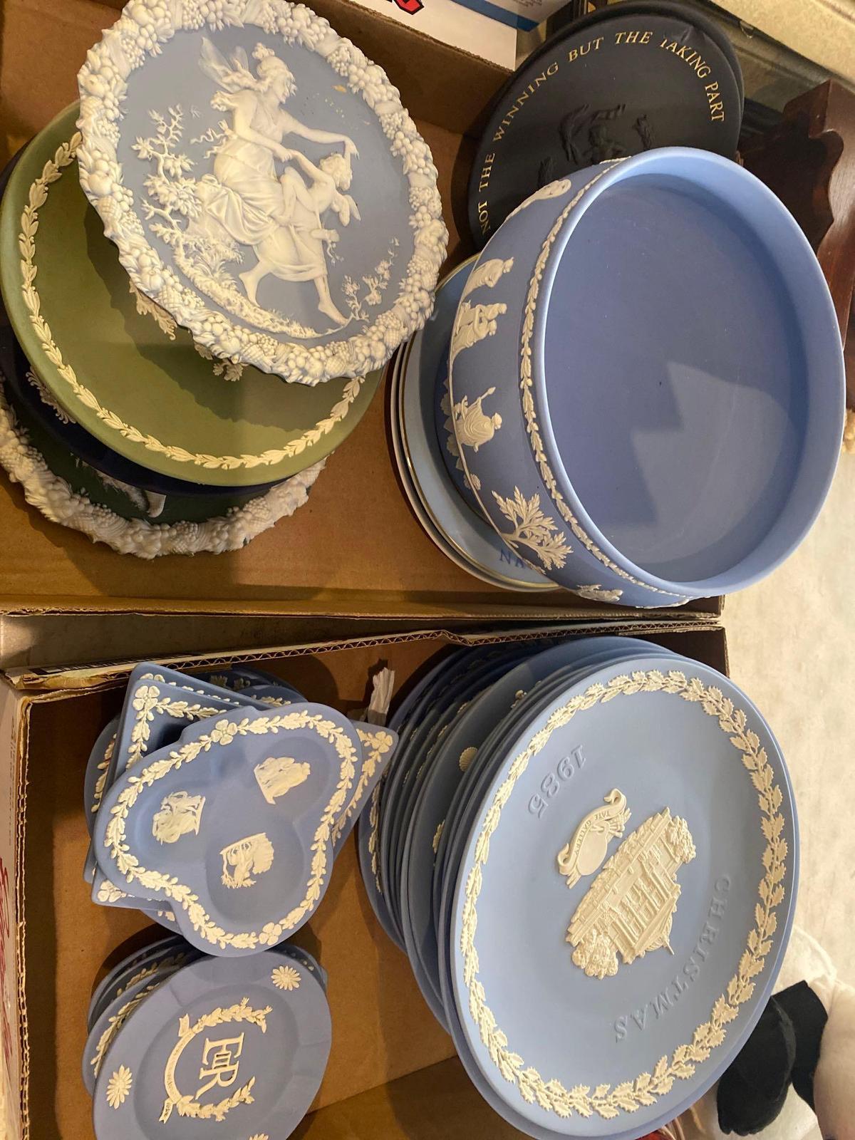 2 flats of wedgewood collectible plates , bowls